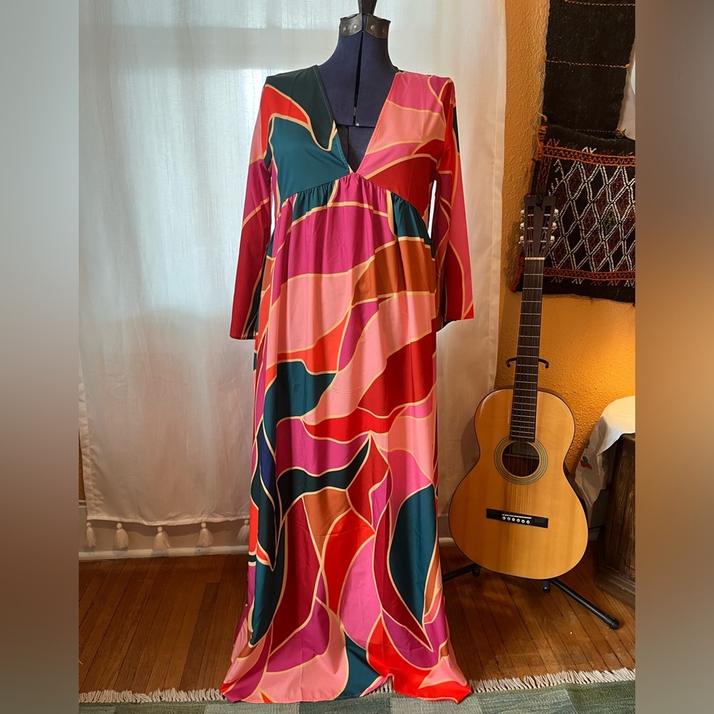 Boho deep v maxi, 3/4 sleeves. Brand new with tags. Jewel tones, full length.